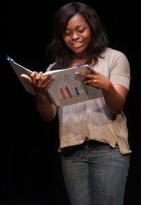 Tiara Brown performs her children’s literature piece, The Day the Crayons Quit, which she took to States. 