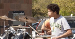 Jordon Moore banging on the drums at the Spring Lunch Jam.