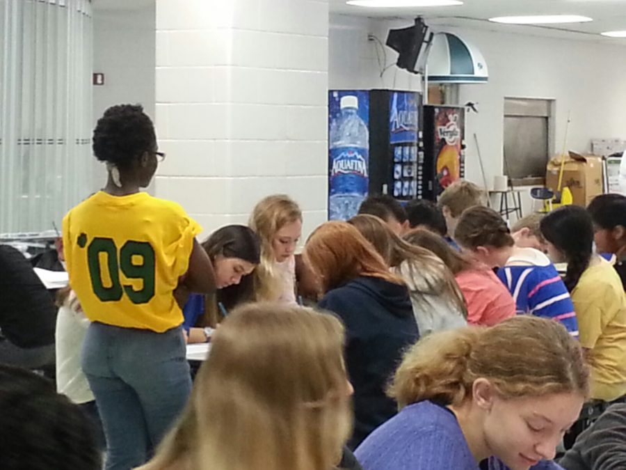 Jesula Fleurizard guides her group of freshmen while they write letters to their future-selves.