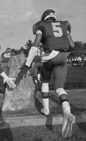 Wildecats Cage the Hawks in Football Season Opener