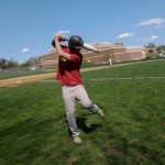 Baseball players work hard during practice and support each other during games.