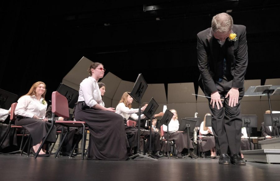 Mr. Dutrow bowing after conducting his last concert.