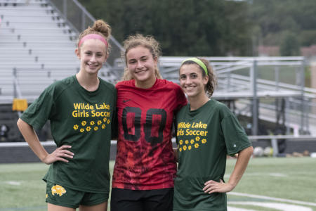 From left to right: Julianna Bonner, Jenna Hutchison and Lily Dunbar pose for a picture. 