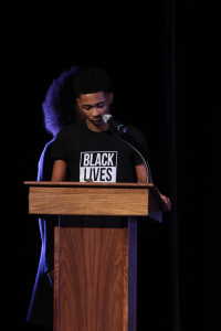 Senior Corey Cooke proves his growth as he speaks at the Black History Month Assembly.