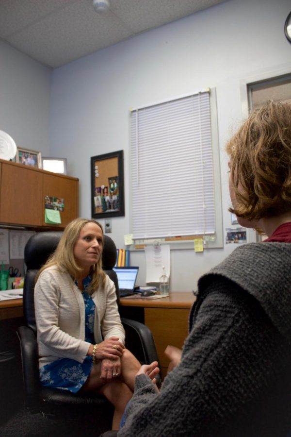 Wilde Lake Student is seen receiving information from guidance counselor, Ms. Pruett.   