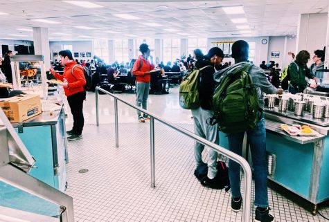 Students in the Wilde Lake cafeteria. Photo by Ayonna Ramey, edited by Sarah Rubin.