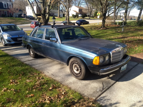 My Mercedes enjoying its favorite pastime: leaking oil all over the driveway