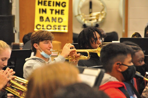 Masked Musicians Adjust to Playing Together Again
