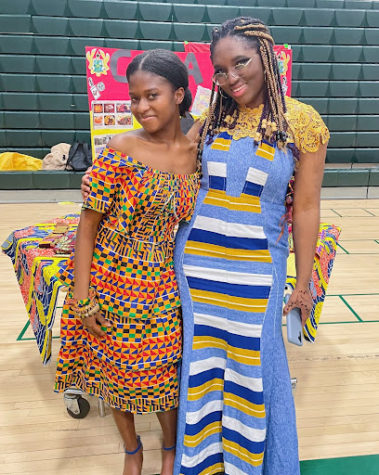 Emmanuella Osei and Nana Nsiah-Poku wearing Kente cloth to represent Ghana. 