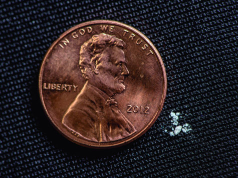 A penny next to a lethal dose of fentanyl. 