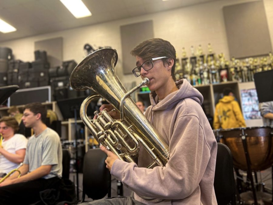 Jake Domenick-Urbansky performing Wind Ensemble latest piece, “Of Our New Day Begun” by Omar Thomas. (Photo by Charlotte Fetters)