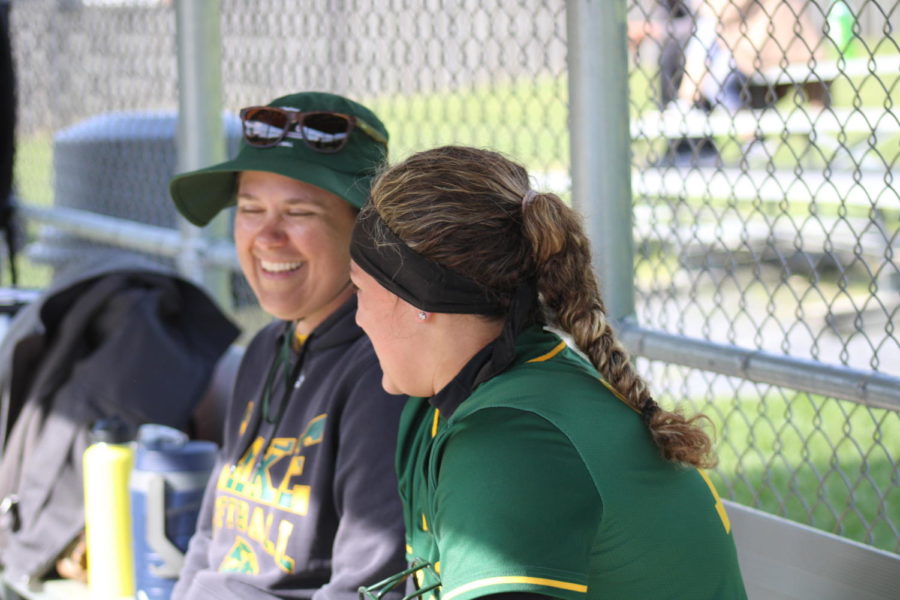 Coach Tee and senior captain Justyce Richard bonding during a home game. “It kind of feels like a family.  It’s very family oriented. We are all very close and just have that connection. Our coach creates that. We  spend a lot of time bonding in practice and through games. We have to in order to win,” said Justyce. 