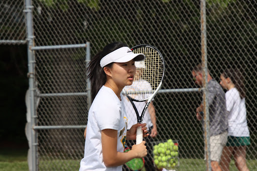 Assistant captain Johanna Shin playing her match against Oakland Mills on April 27, 2023. The Wildecats took down the Scorpions.