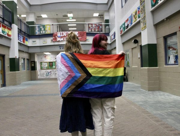 Gay Straight Alliance members and juniors Tommy Heffner and Sabrina Yastuake walk through Main Street with the progress flag on their backs. Through Wilde Lake’s inclusive environment, they bond over their shared identity. This community earned Wilde Lake the Rainbow Ribbon.