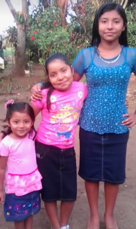 Zulma Aguilar (center) and her two sisters in El Salvador. Zulma’s younger sister stayed in El Salvador while her and her older sister moved to America. 