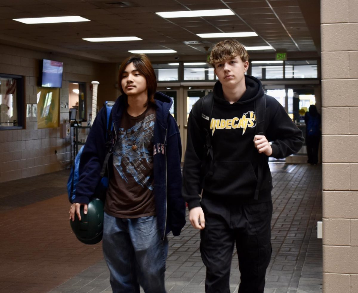 COLUMBIA, MARYLAND, APRIL 4, 2024 -- ARL students Liam Hoagland and Jathan Nguyen walk in through the front entrance after returning from their ARL classes. Per the new policy, students are only allowed to use this entrance. 
