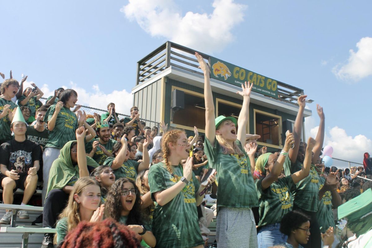 COLUMBIA, MARYLAND, SEPTEMBER 20, 2024 -- The senior class jumps out of their seats to cheer after their pep rally win was announced. 