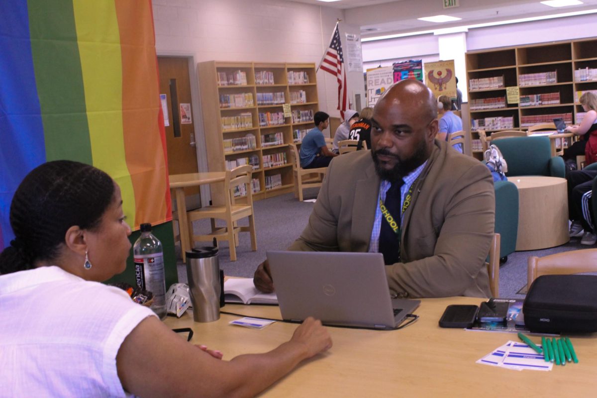 COLUMBIA, MARYLAND, NOVEMBER 7, 2024 - Wilde Lake’s new Principal Mr. Michael Brown held his first Meet and Greet of the school year on November 7. All staff was encouraged to sit down with Mr. Brown to voice their thoughts and concerns. Ms. Kazandra Anderson, the school social worker within the Teen Parenting Program, talks about the program with Mr. Brown.