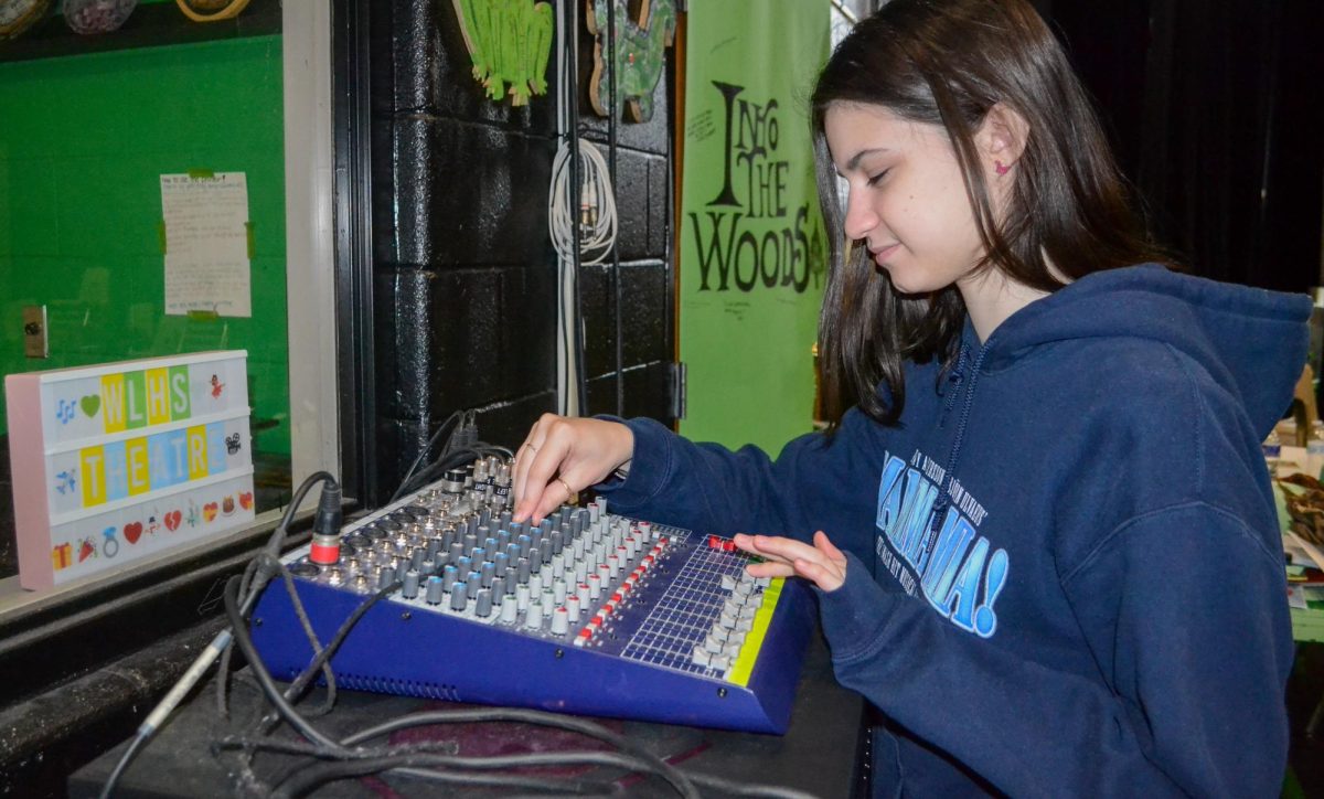 COLUMBIA, MARYLAND, FEBRUARY 4, 2025 - Stage manager Katie Yarrish adjusts the light cues for the Mini Theater. 