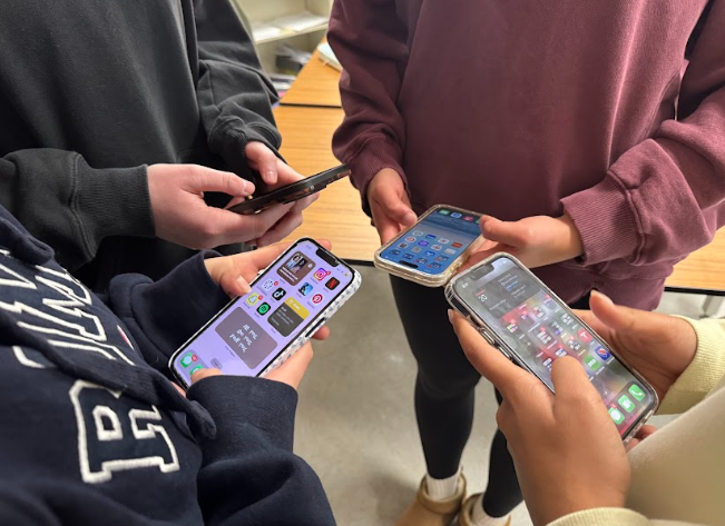 COLUMBIA, MD, FEBRUARY 20, 2025 - Students use their phones during second period under the old cell phone policy. 