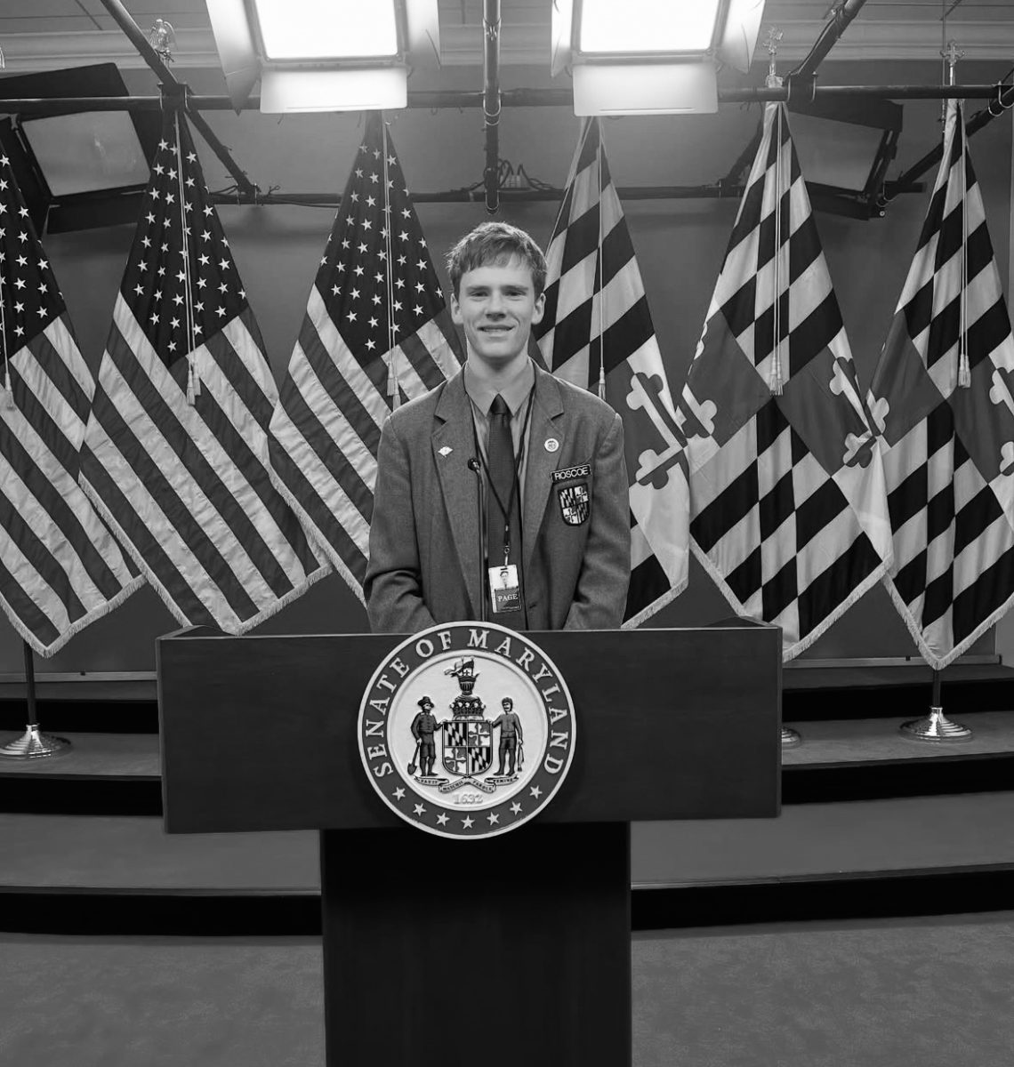 Roscoe Grader stands at a podium in the Senate press room. He worked as a House page through the MGA Student Page Program. PHOTO COURTESY OF ROSCOE GRADER